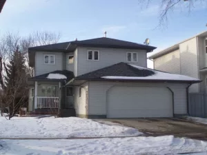 Two-storey infill home with attached garage in Westmount, Edmonton