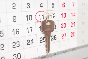 Keys and calendar suggesting real estate conditions